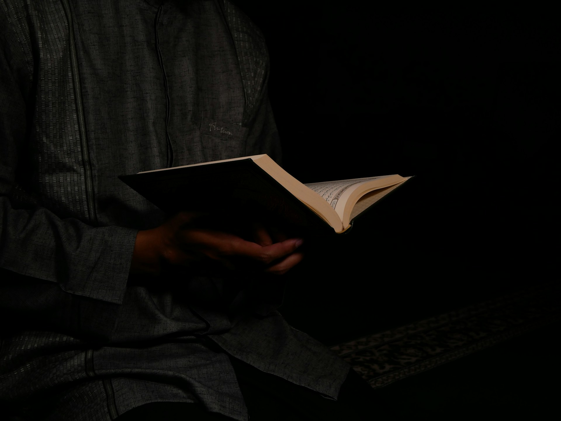 Reading Quran reading quran in the dark